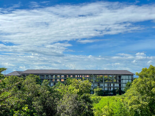 Fototapeta premium Seen from a distance a building (hotel) that is not yet operational (the building is stalled)