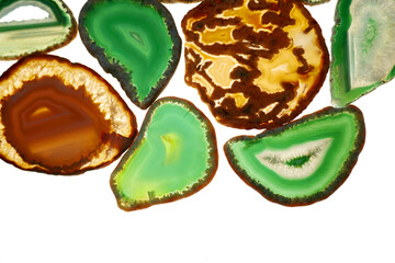 green and brown agate stones . slices of natural stone isolated on white background. Agate pattern In light green and brown tones.Texture of natural stone agate.Agate geode crystal.