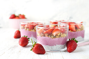 Dessert with chia pudding, granola and strawberries