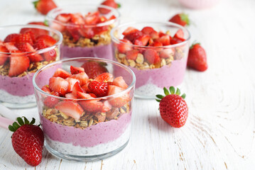 Dessert with chia pudding, granola and strawberries