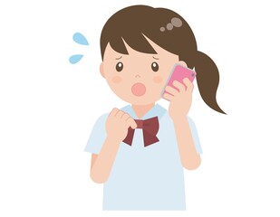 電話で話す困り顔の女の子