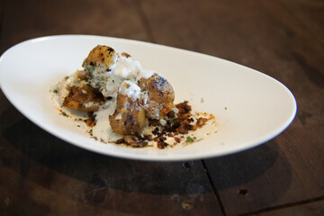 baked roasted potatoes with sour cream and herb