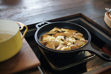 fried potatoes roasting in frying pan