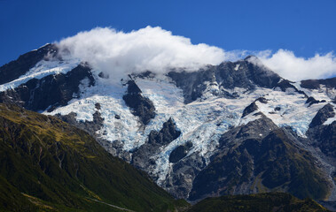 spectacular view of rugged mountain peaks  and glaciers, near mount cook village, on the south island of new zealand