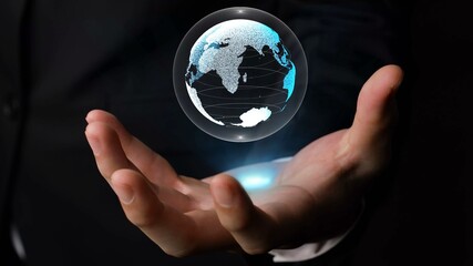 Human hand holding earth globe holographic technology . Futuristic visualization for virtual...