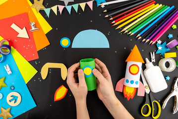 Step-by-step instruction crafts with children from rolls of toilet paper on the theme of space and rocket. Step 3.