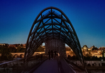 Tbilisi, Georgia - August 20, 2020: Bridge of Peace in the evening