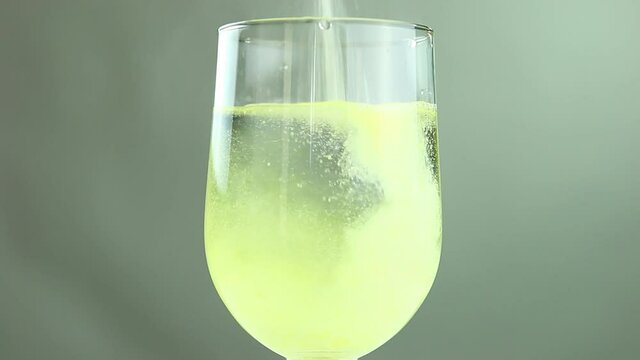 Pouring electrolyte powder in to the glass, in studio   Chiangmai  Thailand