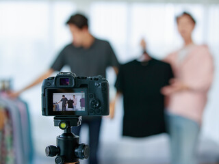 Camera near male fashion bloggers