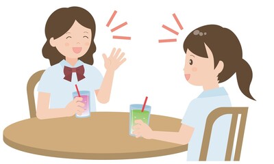 カフェでおしゃべりする女子学生