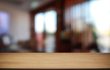 Empty wooden table in front of abstract blurred background of coffee shop . can be used for display or montage your products.Mock up for display of product