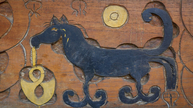 Closeup view of traditional Ngada people or tribe wood carving of black horse symbol in Tololela village near Bajawa, Flores, East Nusa Tenggara, Indonesia