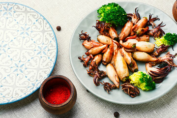 Grilled squids in plate