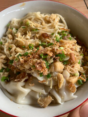 Chicken noodle or mi ayam with wonton.