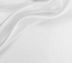 Fototapeta premium Smooth elegant white silk or satin luxury cloth texture as wedding background. Luxurious background design