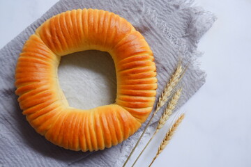 a trending bread named wool roll bread in white background