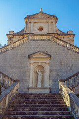 Fototapeta na wymiar Religious architecture. Montenegro, Kotor. Ancient Catolic church of Birth of Our Lady in Prcanj town