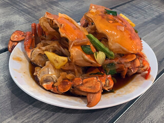 Sweet sour crab served on a plate.