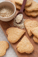 Homemade crispy cookies with sesame seeds in the shape of heart