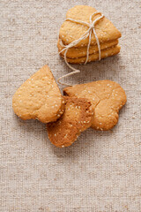 Homemade crispy cookies with sesame seeds in the shape of heart
