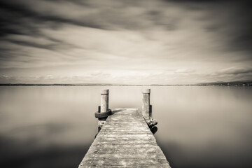 Lake Zug in Switzerland. Wooden pier.