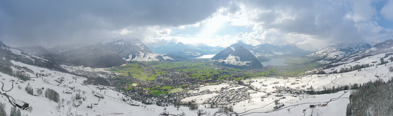 Wide panorama of the winter landscape. Canton Schwyz. Central Switzerland.