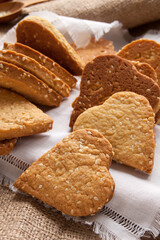Homemade crispy cookies with sesame seeds in the shape of heart
