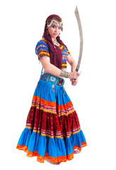 Beautiful young female belly dancer with red a blue dress and sword
