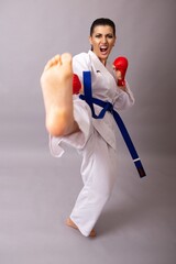 woman karate box kick kickboxing
