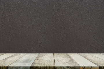 Empy floor wooden perspective with black dark wall room display and soft light. old interior blank with wooden table. you can add text or products for presentation.