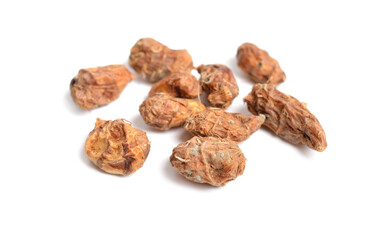 Dried tubers Cyperus esculentus also called chufa, tiger nut, atadwe, yellow nutsedge, and earth almond. Isolated