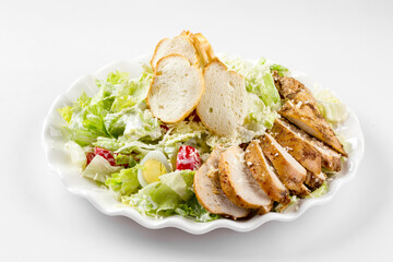 Isolated russian style caesar chicken salad on the white background