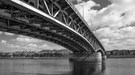 Bridge in Budapest over the Danube river in black and white style