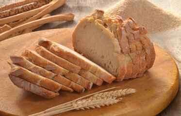 toast wheat white bread sliced on rustic background.