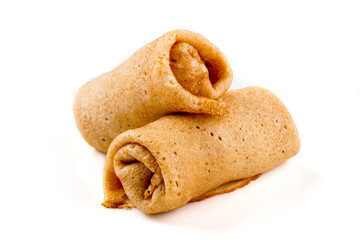 Isolated russian cuisine stuffed pancake rolls on the white background
