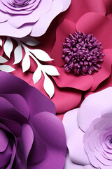 Different beautiful flowers and branches made of paper as background, top view