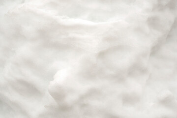 Abstract white background. Snow surface texture. Macro.