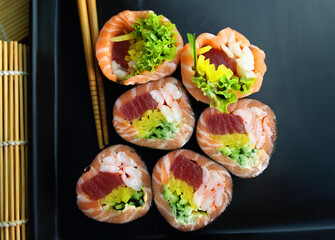 colorful and interesting sushi rolls served in an appetizing way