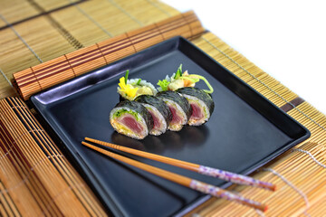 colorful and interesting sushi rolls served in an appetizing way