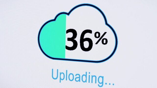 Uploading files to the cloud on Computer Screen. Selective focus and screen pixel effect