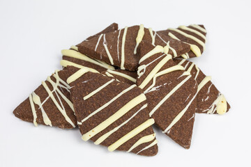 heap of cocoa shortbread diamond cookies with white chocolate