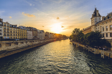 Obraz premium Court of Cassation of france in paris and left bank of seine river at dusk