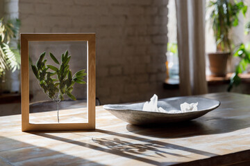 frame with pressed plants. A picture of dried flowers
