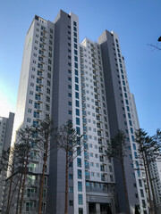 Apartment tower in front of a blue sky in South Korea