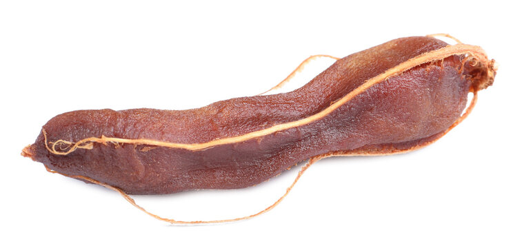 Ripe peeled tamarind on white background. Exotic fruit