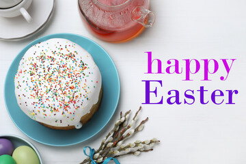 Happy holiday. Easter cake served on white wooden table, flat lay