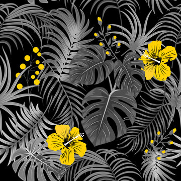 Tropical vector seamless pattern with  leaves of palm tree and flowers