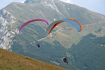 Flying on a paraglider.  View of the Monte Baldo mountain, Italy, from a height.