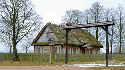 Fototapeta na wymiar a wooden Mazovian cottage from the second half of the 19th century in a wooden village in Mazovia, Poland