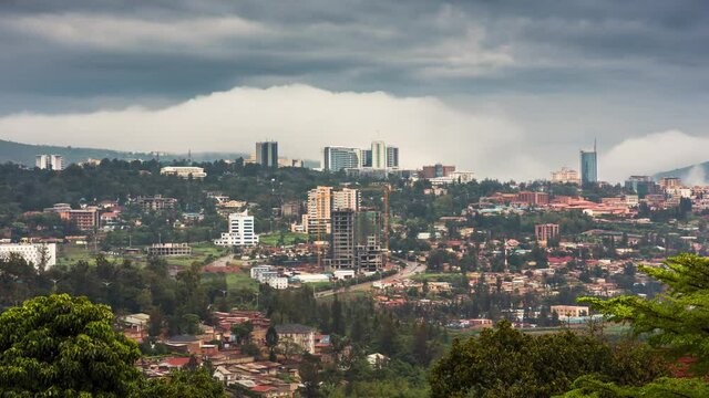 Timelapse video of Kigali city skyline and surrounding areas, showing movement of clouds and cars. Rwanda